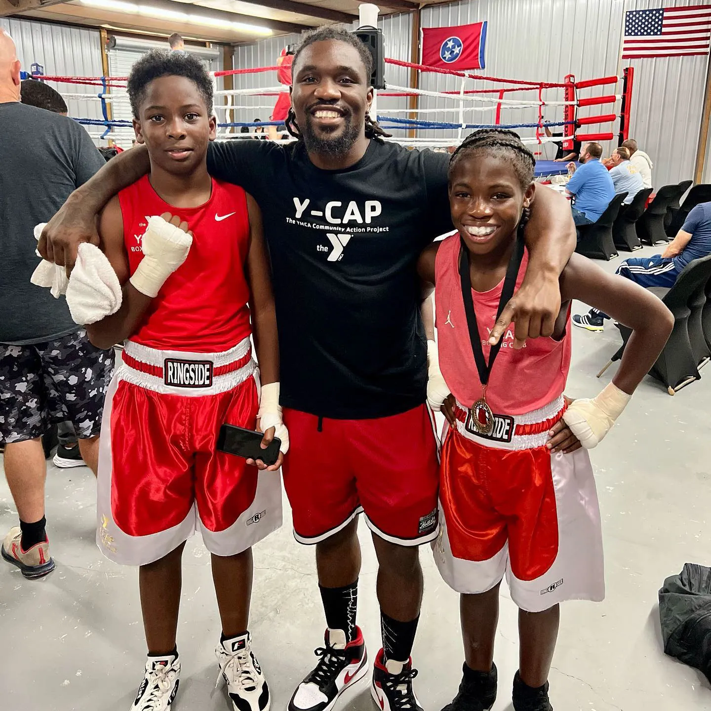 Boxing YCAP kids smiling with Roger